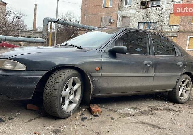 Черный Форд Мондео, объемом двигателя 1.8 л и пробегом 250 тыс. км за 1600 $, фото 1 на Automoto.ua