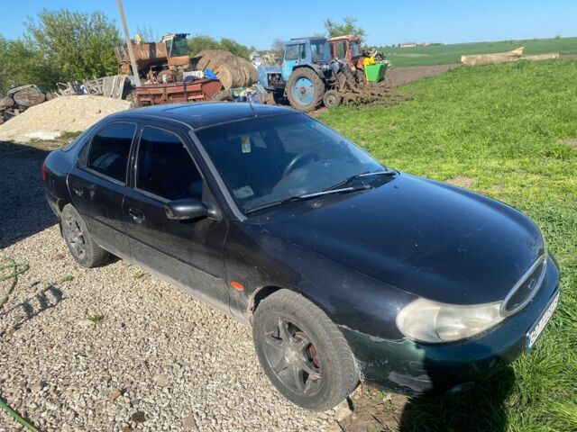 Черный Форд Мондео, объемом двигателя 1.8 л и пробегом 300 тыс. км за 1500 $, фото 1 на Automoto.ua