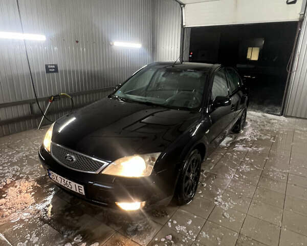 Черный Форд Мондео, объемом двигателя 2 л и пробегом 350 тыс. км за 2000 $, фото 1 на Automoto.ua