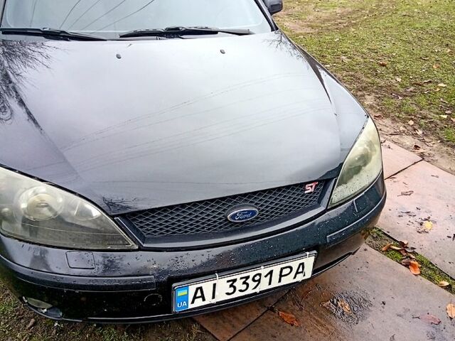 Черный Форд Мондео, объемом двигателя 2.5 л и пробегом 222 тыс. км за 4500 $, фото 1 на Automoto.ua