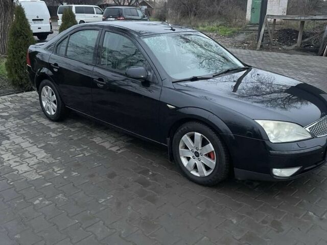 Черный Форд Мондео, объемом двигателя 2 л и пробегом 295 тыс. км за 3900 $, фото 1 на Automoto.ua