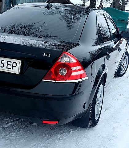 Черный Форд Мондео, объемом двигателя 1.8 л и пробегом 330 тыс. км за 5700 $, фото 1 на Automoto.ua