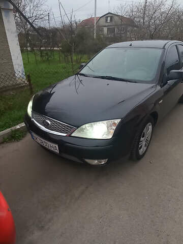 Черный Форд Мондео, объемом двигателя 2 л и пробегом 236 тыс. км за 5400 $, фото 1 на Automoto.ua