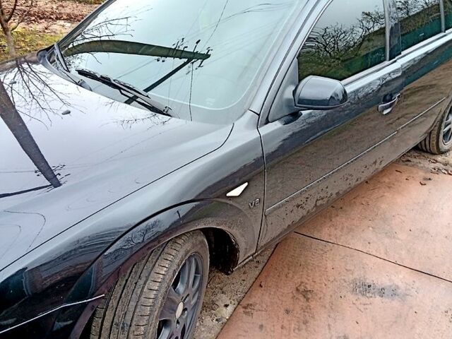 Черный Форд Мондео, объемом двигателя 2 л и пробегом 280 тыс. км за 4000 $, фото 1 на Automoto.ua