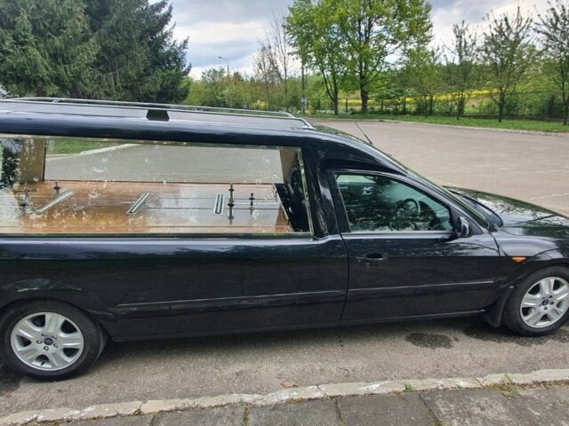 Чорний Форд Мондео, об'ємом двигуна 2 л та пробігом 64 тис. км за 4745 $, фото 1 на Automoto.ua