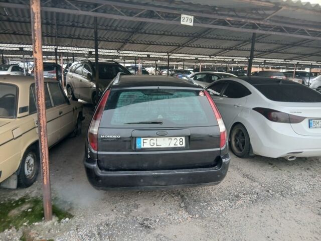 Черный Форд Мондео, объемом двигателя 2 л и пробегом 453 тыс. км за 1599 $, фото 1 на Automoto.ua