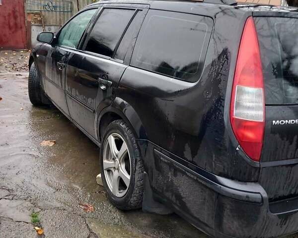 Черный Форд Мондео, объемом двигателя 2 л и пробегом 320 тыс. км за 3900 $, фото 1 на Automoto.ua