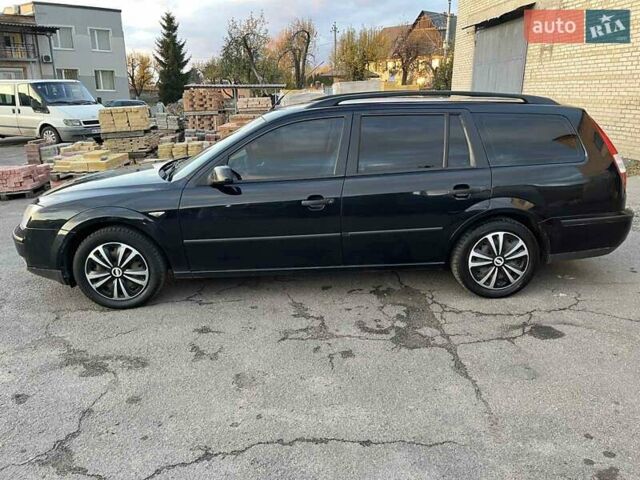 Черный Форд Мондео, объемом двигателя 1.8 л и пробегом 316 тыс. км за 3500 $, фото 1 на Automoto.ua