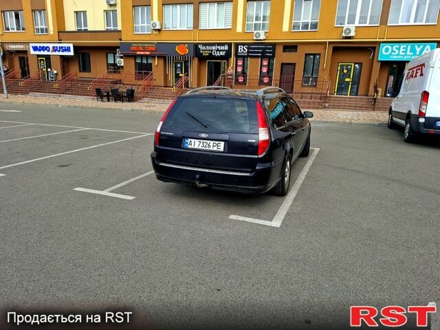 Чорний Форд Мондео, об'ємом двигуна 2 л та пробігом 230 тис. км за 5250 $, фото 1 на Automoto.ua