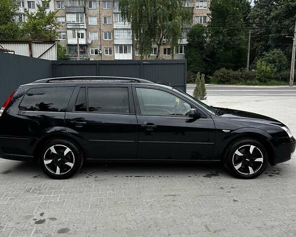 Черный Форд Мондео, объемом двигателя 2 л и пробегом 321 тыс. км за 5000 $, фото 1 на Automoto.ua