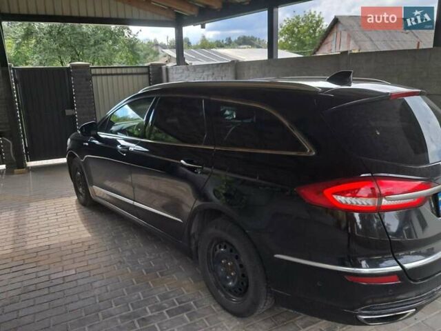 Черный Форд Мондео, объемом двигателя 2 л и пробегом 180 тыс. км за 15000 $, фото 1 на Automoto.ua
