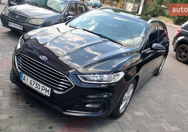 Чорний Форд Мондео, об'ємом двигуна 2 л та пробігом 250 тис. км за 17800 $, фото 1 на Automoto.ua