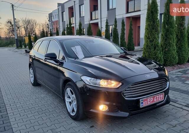 Черный Форд Мондео, объемом двигателя 2 л и пробегом 228 тыс. км за 13800 $, фото 1 на Automoto.ua