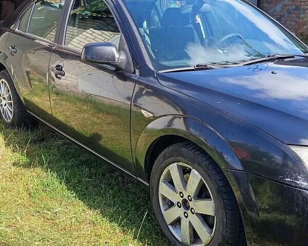 Черный Форд Мондео, объемом двигателя 2 л и пробегом 323 тыс. км за 3000 $, фото 1 на Automoto.ua