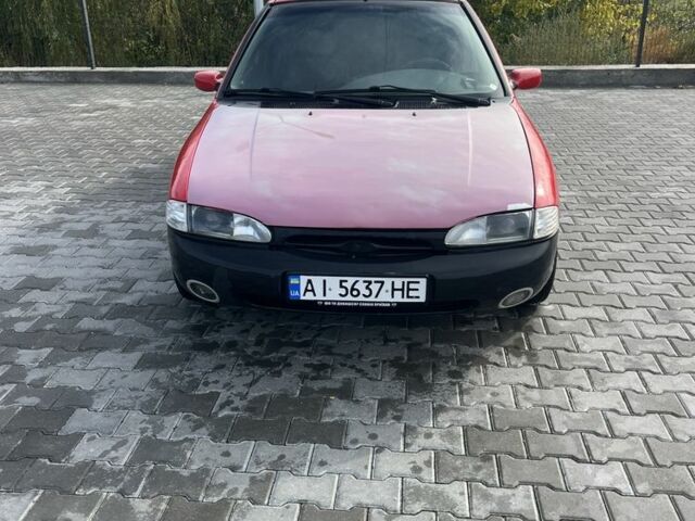 Красный Форд Мондео, объемом двигателя 1.8 л и пробегом 100 тыс. км за 1900 $, фото 1 на Automoto.ua