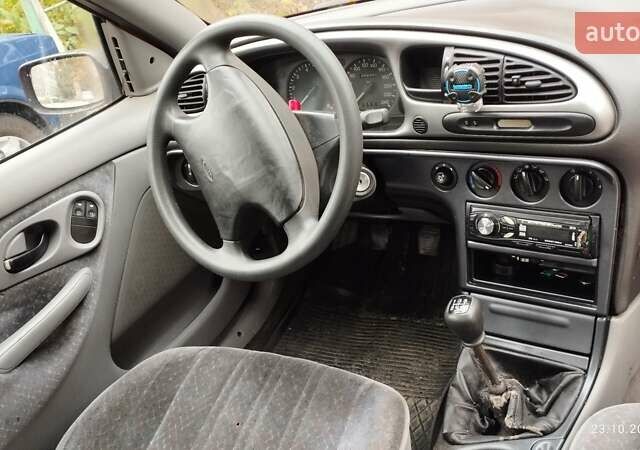 Червоний Форд Мондео, об'ємом двигуна 1.8 л та пробігом 273 тис. км за 1200 $, фото 1 на Automoto.ua