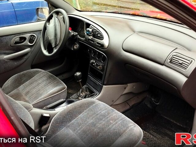 Красный Форд Мондео, объемом двигателя 1.8 л и пробегом 200 тыс. км за 13200 $, фото 1 на Automoto.ua