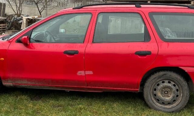 Красный Форд Мондео, объемом двигателя 1.6 л и пробегом 300 тыс. км за 1100 $, фото 1 на Automoto.ua