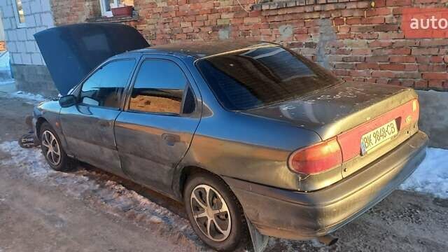 Серый Форд Мондео, объемом двигателя 1.8 л и пробегом 492 тыс. км за 927 $, фото 1 на Automoto.ua