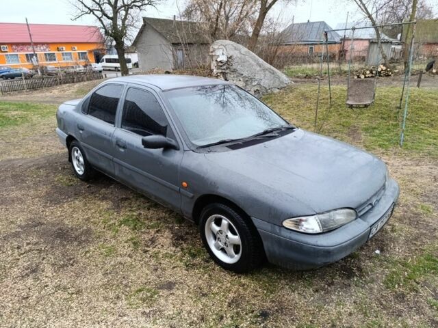 Серый Форд Мондео, объемом двигателя 1.8 л и пробегом 438 тыс. км за 900 $, фото 1 на Automoto.ua