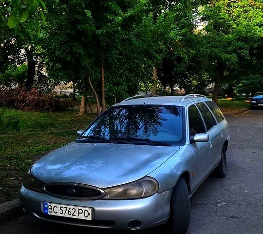 Серый Форд Мондео, объемом двигателя 1.8 л и пробегом 248 тыс. км за 1050 $, фото 1 на Automoto.ua