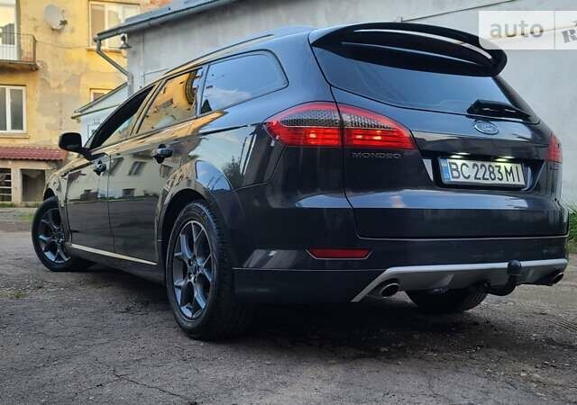Сірий Форд Мондео, об'ємом двигуна 2.2 л та пробігом 252 тис. км за 9333 $, фото 1 на Automoto.ua
