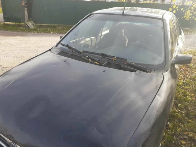 Синий Форд Мондео, объемом двигателя 1.8 л и пробегом 399 тыс. км за 938 $, фото 1 на Automoto.ua