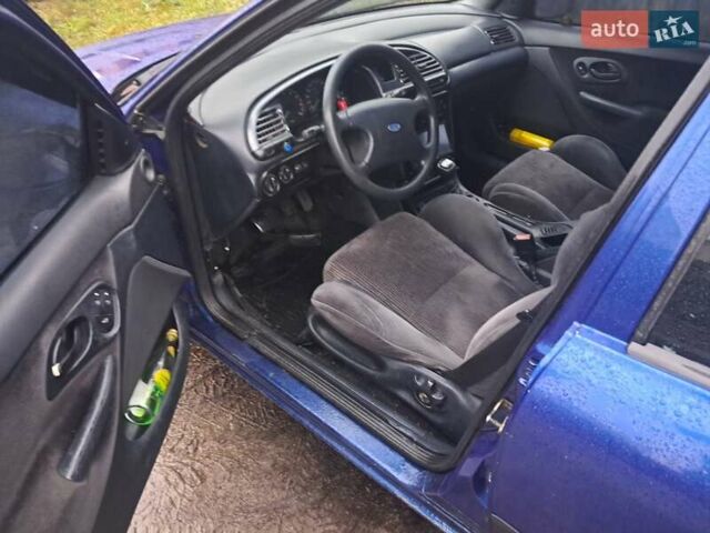 Синий Форд Мондео, объемом двигателя 1.8 л и пробегом 405 тыс. км за 1650 $, фото 1 на Automoto.ua