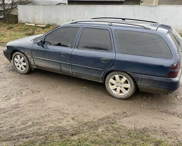 Синий Форд Мондео, объемом двигателя 1.8 л и пробегом 345 тыс. км за 1811 $, фото 1 на Automoto.ua