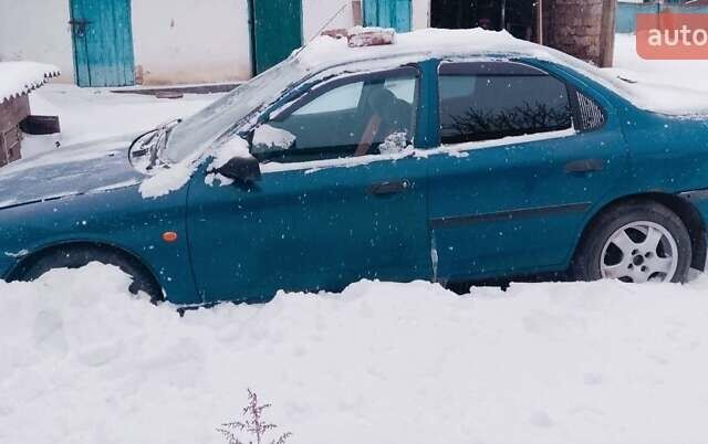 Синий Форд Мондео, объемом двигателя 1.6 л и пробегом 326 тыс. км за 750 $, фото 1 на Automoto.ua