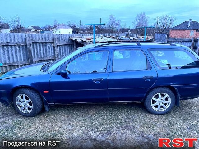 Синий Форд Мондео, объемом двигателя 1.8 л и пробегом 405 тыс. км за 1450 $, фото 1 на Automoto.ua