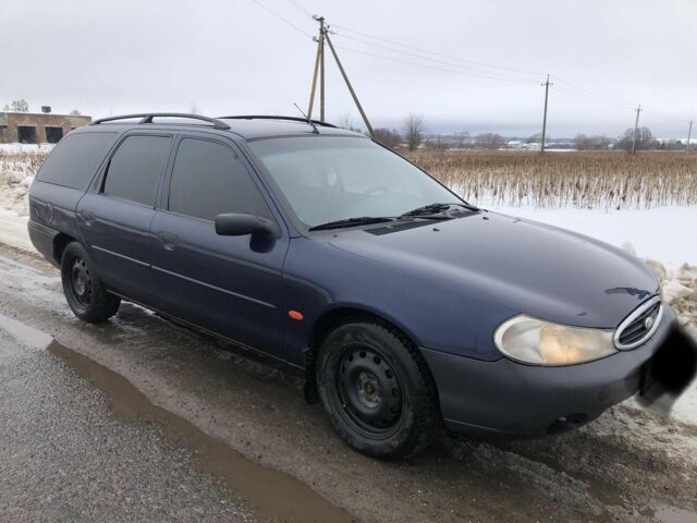 Синий Форд Мондео, объемом двигателя 1.8 л и пробегом 327 тыс. км за 1550 $, фото 1 на Automoto.ua