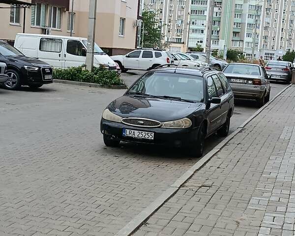 Синий Форд Мондео, объемом двигателя 1.8 л и пробегом 322 тыс. км за 850 $, фото 1 на Automoto.ua