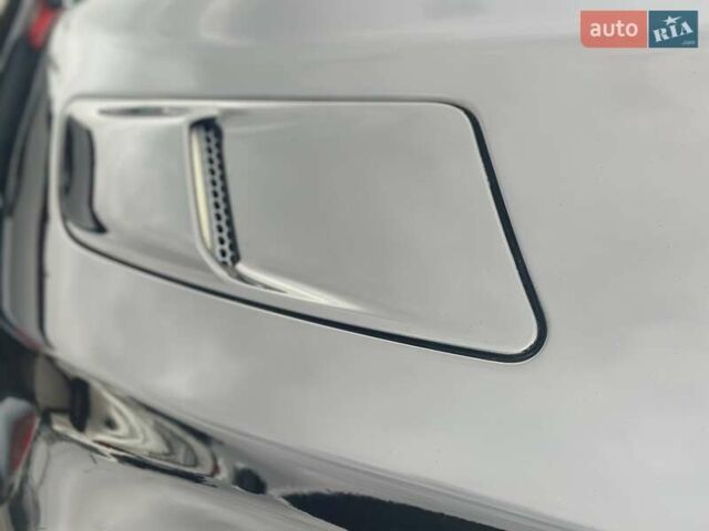 Черный Форд Мустанг, объемом двигателя 5.16 л и пробегом 124 тыс. км за 31500 $, фото 1 на Automoto.ua