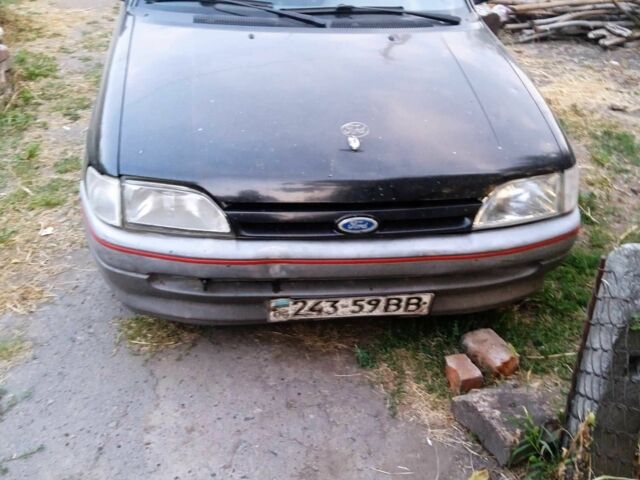 Черный Форд Орион, объемом двигателя 1.6 л и пробегом 2 тыс. км за 700 $, фото 1 на Automoto.ua