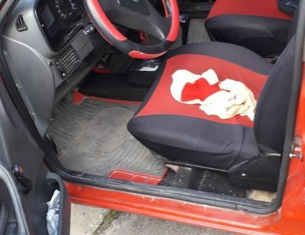 Красный Форд Орион, объемом двигателя 1.8 л и пробегом 480 тыс. км за 550 $, фото 1 на Automoto.ua