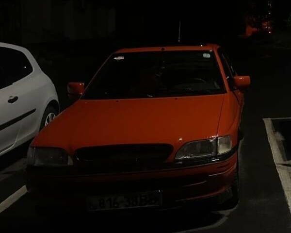 Красный Форд Орион, объемом двигателя 1.8 л и пробегом 56 тыс. км за 750 $, фото 1 на Automoto.ua