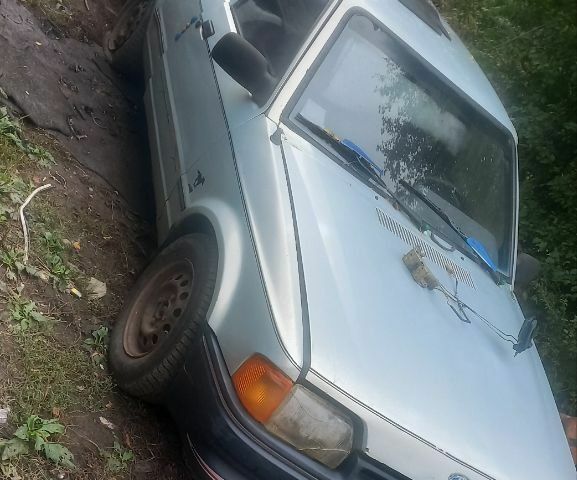 Серый Форд Орион, объемом двигателя 0 л и пробегом 360 тыс. км за 460 $, фото 1 на Automoto.ua