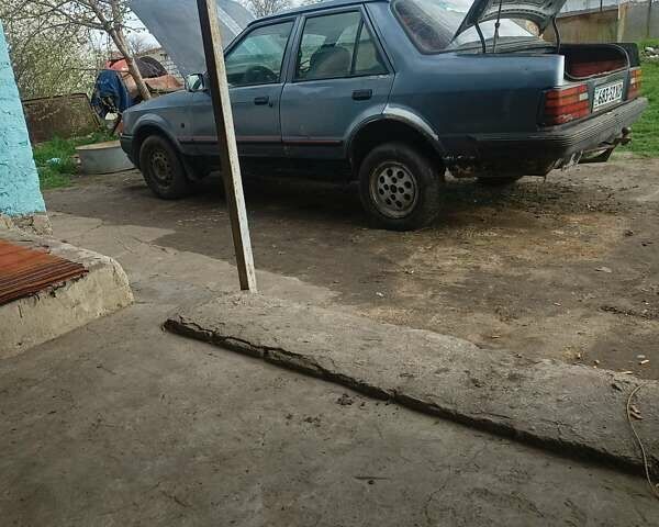 Серый Форд Орион, объемом двигателя 0 л и пробегом 100 тыс. км за 472 $, фото 1 на Automoto.ua