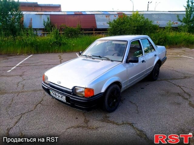 Серый Форд Орион, объемом двигателя 1.6 л и пробегом 241 тыс. км за 650 $, фото 1 на Automoto.ua