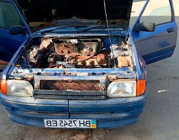 Синий Форд Орион, объемом двигателя 1.5 л и пробегом 360 тыс. км за 250 $, фото 1 на Automoto.ua