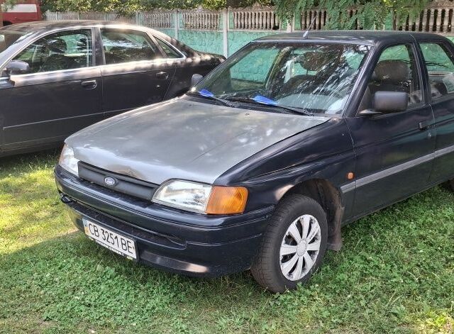 Синий Форд Орион, объемом двигателя 1.4 л и пробегом 300 тыс. км за 516 $, фото 1 на Automoto.ua