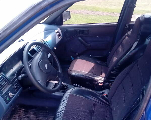 Синий Форд Орион, объемом двигателя 1.75 л и пробегом 300 тыс. км за 1000 $, фото 1 на Automoto.ua