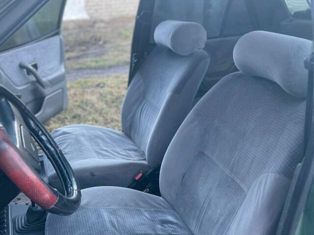 Зеленый Форд Орион, объемом двигателя 1.4 л и пробегом 97 тыс. км за 400 $, фото 1 на Automoto.ua