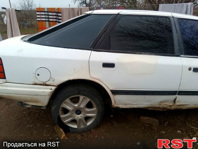 Білий Форд Скорпіо, об'ємом двигуна 2.4 л та пробігом 314 тис. км за 690 $, фото 1 на Automoto.ua