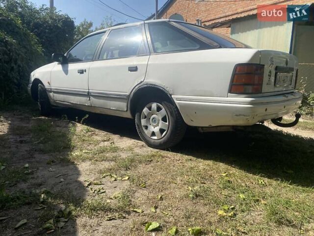 Белый Форд Скорпио, объемом двигателя 2 л и пробегом 360 тыс. км за 1100 $, фото 1 на Automoto.ua