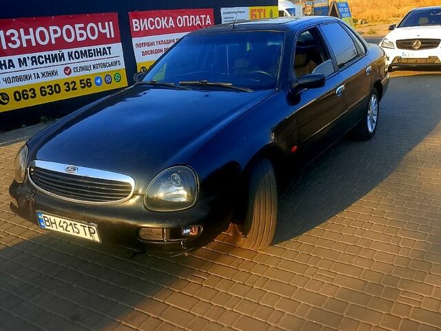 Чорний Форд Скорпіо, об'ємом двигуна 2 л та пробігом 300 тис. км за 1000 $, фото 1 на Automoto.ua