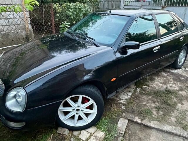 Чорний Форд Скорпіо, об'ємом двигуна 2 л та пробігом 340 тис. км за 1499 $, фото 1 на Automoto.ua