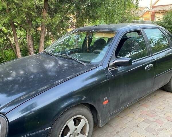 Черный Форд Скорпио, объемом двигателя 2.3 л и пробегом 250 тыс. км за 900 $, фото 1 на Automoto.ua