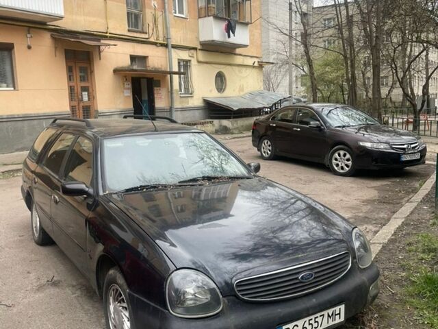Черный Форд Скорпио, объемом двигателя 2.3 л и пробегом 300 тыс. км за 1250 $, фото 1 на Automoto.ua